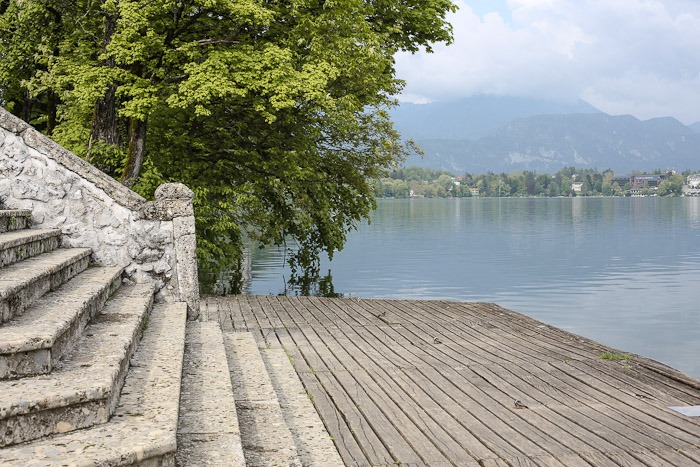 Eastern Europe Slovenia Travel Tourist Lake Bled Pletna Boat Church Mary Row Oars Mountains Steps Monk Stairs Legend Tradition Water Serene Green Scenic chandelier Ring Bell wish