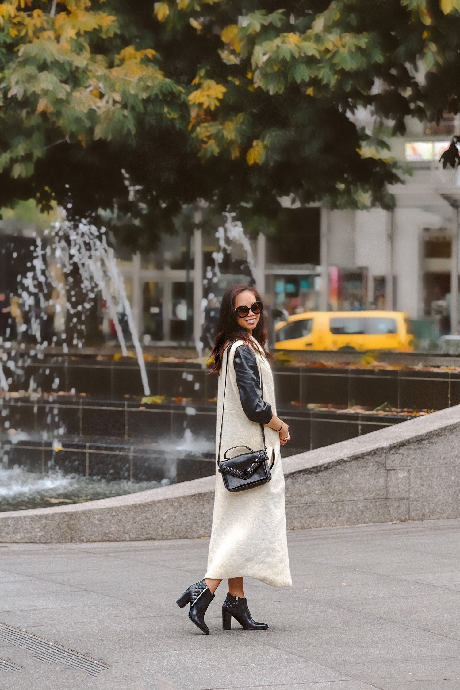 Look, Ma, No Sleeves! How to Wear a Long Sleeveless Vest with Style