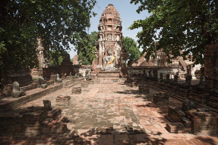 thailand ayutthaya ancient siam ruins buddha wat temple structure stone brick bodhi tree thai summer travel photo sher she goes shershegoes.com