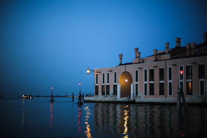 europe italy travel lagoon sea ocean water venetian venezia canal pier light sunset moody light glimmer