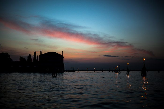 europe italy travel lagoon sea ocean water venetian venezia canal pier light sunset moody